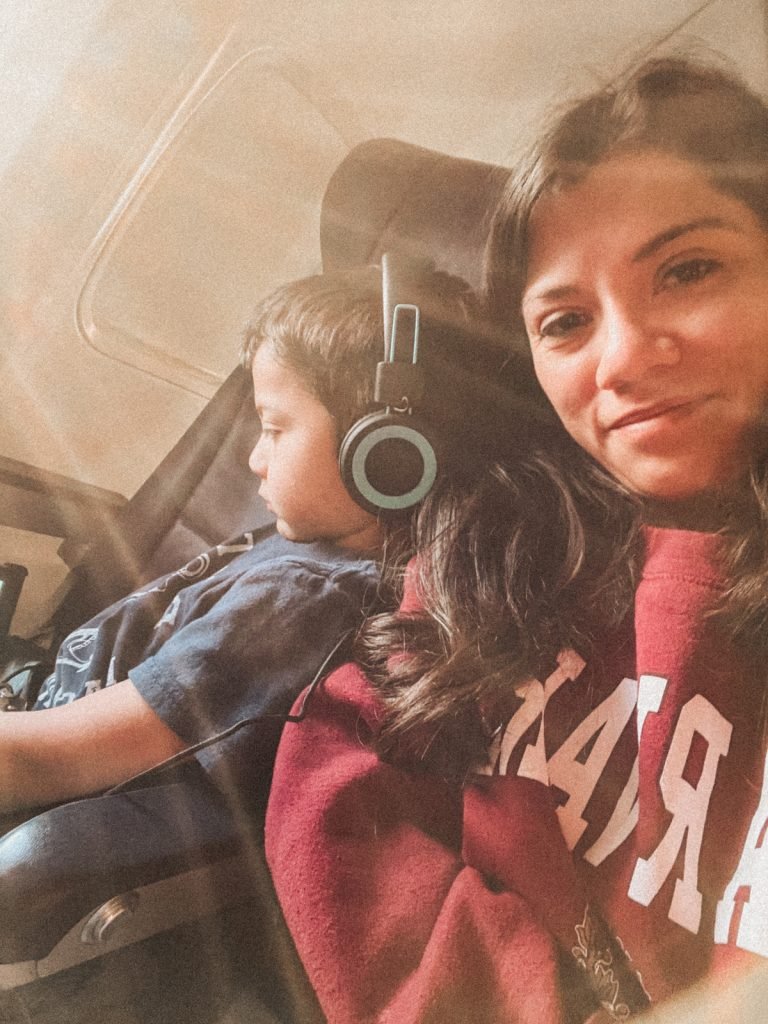 mom and young boy on airplane